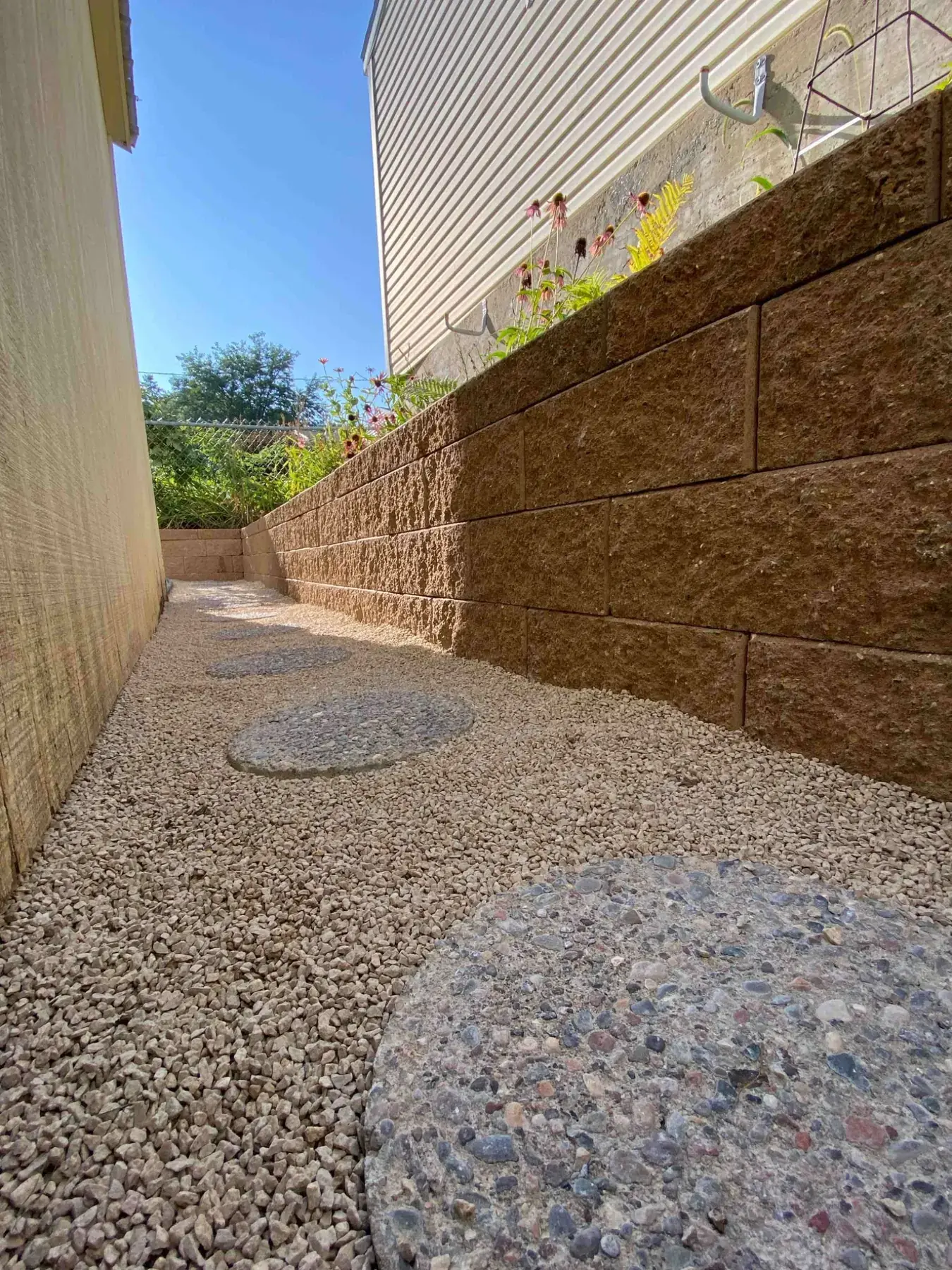 Retaining wall and walkway project completed by Minnlawn