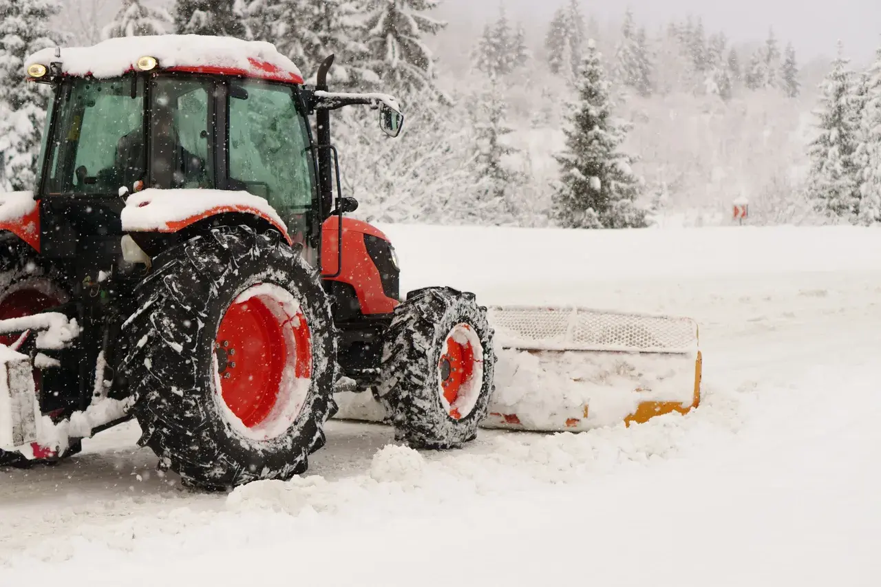 Minnlawn snow removal service clearing a snowy property